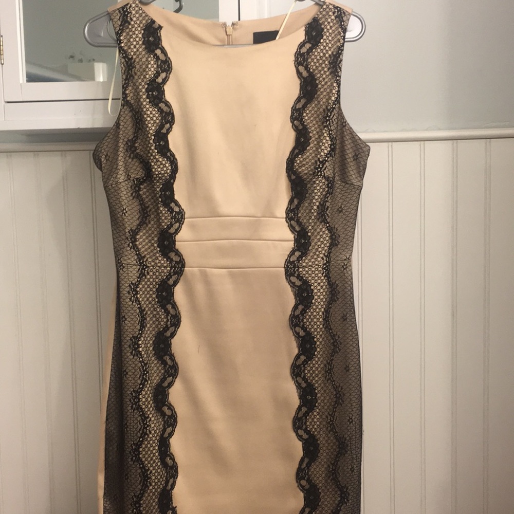 Gold dress with black lace trimmings